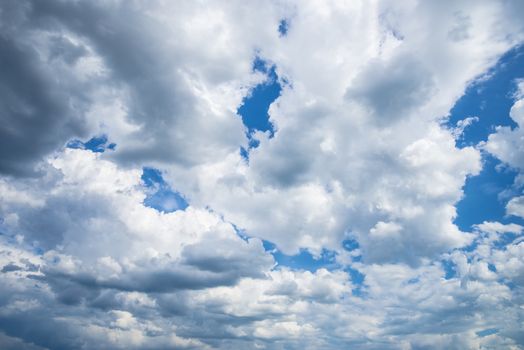 White clouds on the blue sky during the day. Nature landscape