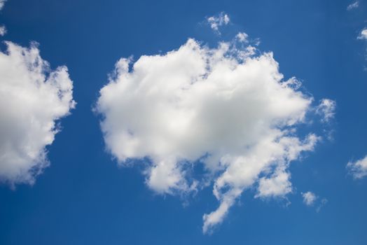 White clouds on the blue sky during the day. Nature landscape