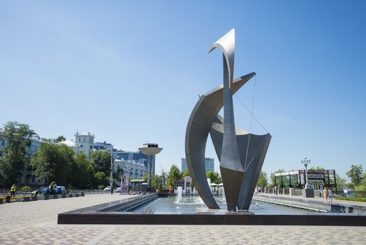 Fountain and sculpture Sail on the Volga river embankment in Samara Russia. On a Sunny summer day. 24 June 2018