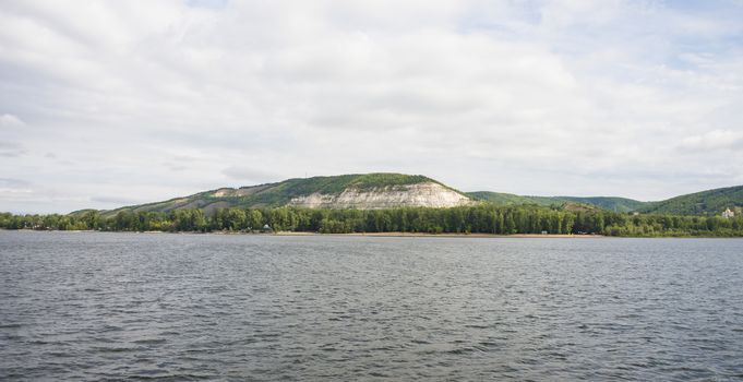 View of the Zhiguli mountains in the Samara region, Russia. Cloudy day, August 10, 2018.