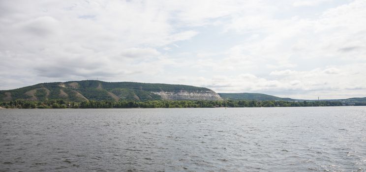 View of the Zhiguli mountains in the Samara region, Russia. Cloudy day, August 10, 2018.