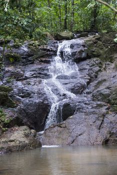 Kathu waterfall in Phuket, Thailand. Summer day.