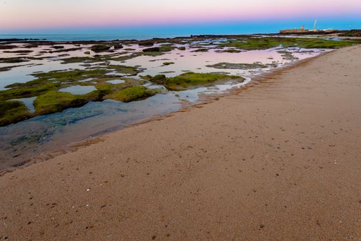 Landscape of the beach of La Caleta on  the province of Cadiz on Spain, about to dawn