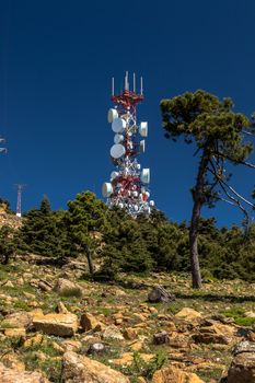 Big communications tower in a sunny day on Estepona, Malaga, Spain