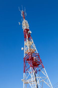 Communications tower with a beautiful blue sky on Puerto Real, Cadiz, Spain