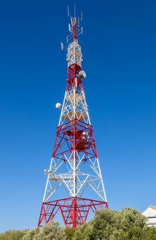 Communications tower with a beautiful blue sky on Puerto Real, Cadiz, Spain