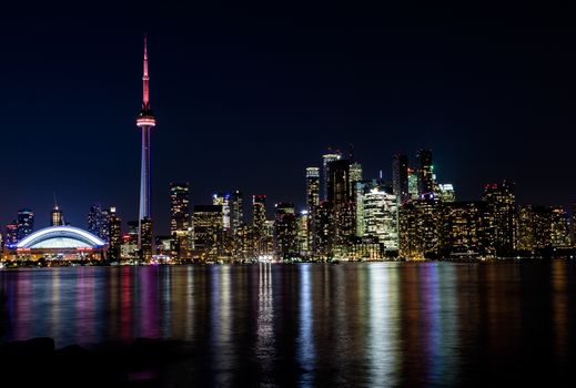 Night View of Downtown Toronto from Toronto Islands with the Lake Ontario, Canada.