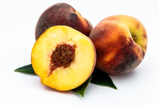 Composition of a bunch of peaches on a white background