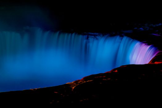 Fantastic Niagara Falls view with Colorful Lights at night, Canadian Falls, Ontario, Canada