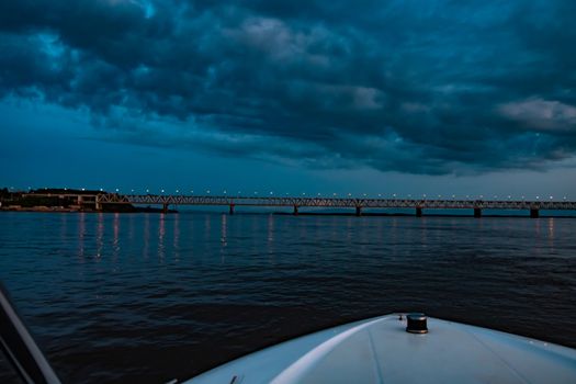 Bridge over the Amur river at sunset. Russia. Khabarovsk. Photo from the middle of the river