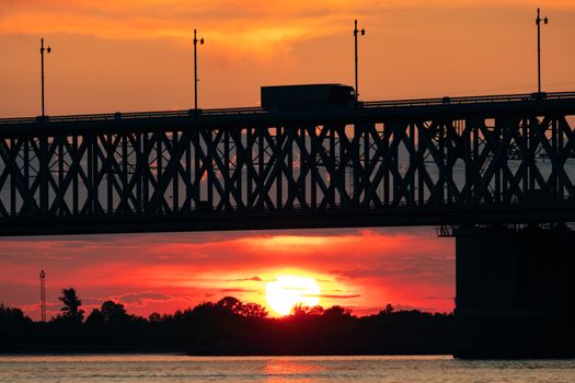 Bridge over the Amur river at sunset. Russia. Khabarovsk. Photo from the middle of the river