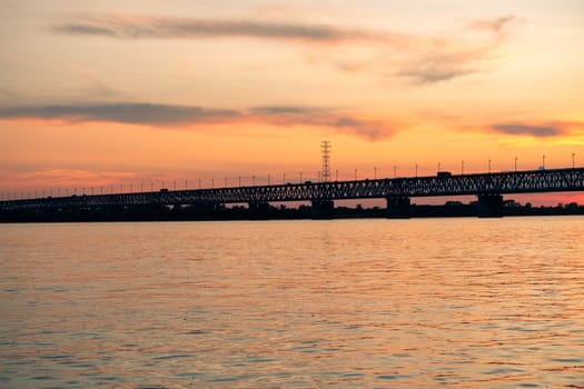 Bridge over the Amur river at sunset. Russia. Khabarovsk. Photo from the middle of the river