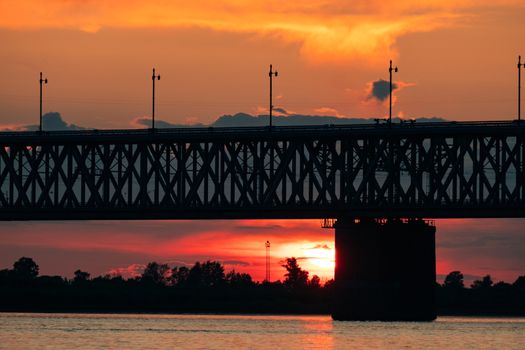 Bridge over the Amur river at sunset. Russia. Khabarovsk. Photo from the middle of the river