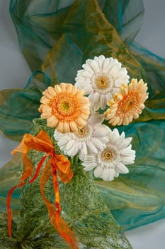 Bouquet with flowers on a studio background