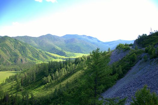 A fragment of a picturesque valley and sheer ruined rocks. Altai, Siberia, Russia.