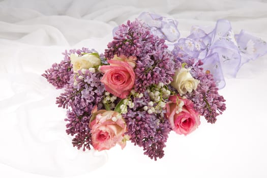 Still life with flowers on a studio background