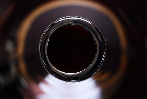 Nice background. Top view of the glass brown bottle