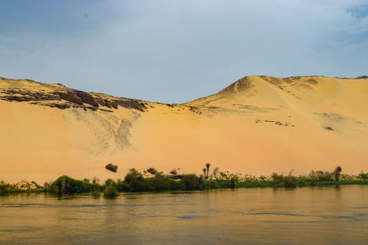 Sand Dunes On the Edge of The River Nile in Aswan Egypt