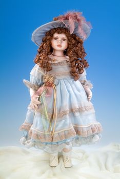 The big doll on a blue and white background