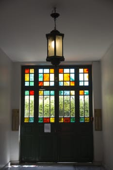 Main entrance door of a large apartment. The colored glasses are so beautiful