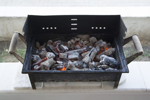 Ashes in barbecue. The coals are warm enough.embers