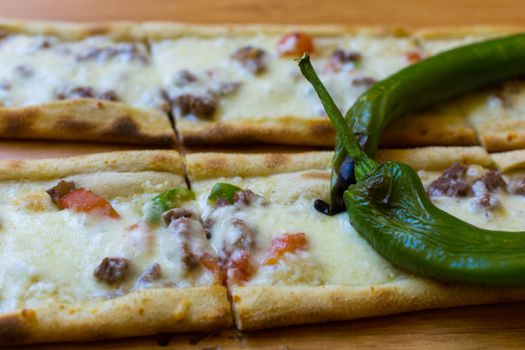 meat pide from traditional Turkish dishes. cheddar cheese.Famous dishes of "Konya" and eastern black sea region