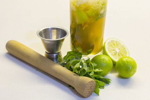 Mojito is a traditional Cuban highball.The mojito is a cocktail of five ingredients: white rum, sugar, lemon juice, soda water and mint.