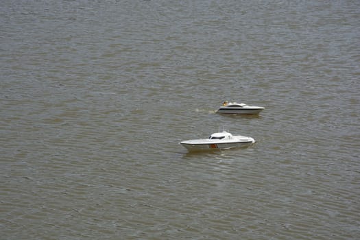 Radio controlled model boat.
They are swimming in the lake.
Driving is very enjoyable