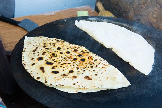 "Gözleme" is a snack prepared by filling the inside of thin slices of doughs with mortar such as cheese, potato, minced meat and then cooking on a steel plate. turkish bough