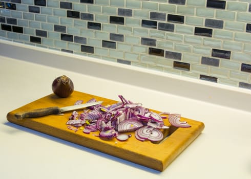 cut onion on the counter.dinner preparation