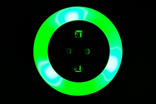 Lamp night light in a dark background. Vintage effect style picture. colorful night light. ring lamp. Neon light circle. the light takes the shape of a circle