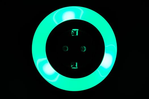 Lamp night light in a dark background. Vintage effect style picture. colorful night light. ring lamp. Neon light circle. the light takes the shape of a circle