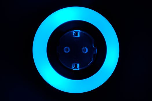 Lamp night light in a dark background. Vintage effect style picture. colorful night light. ring lamp. Neon light circle. the light takes the shape of a circle