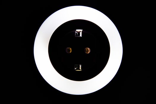 Lamp night light in a dark background. Vintage effect style picture. colorful night light. ring lamp. Neon light circle. the light takes the shape of a circle