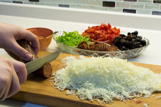 kitchen pizza making. preparing ingredients for pizza.