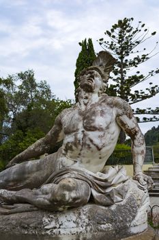 Achilleion palace, Corfu, Greece - August 24, 2018: Sculpture of the dying achilles in achilleion palace corfu