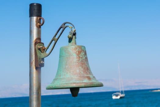 bell on the beach. summer vacation starts
