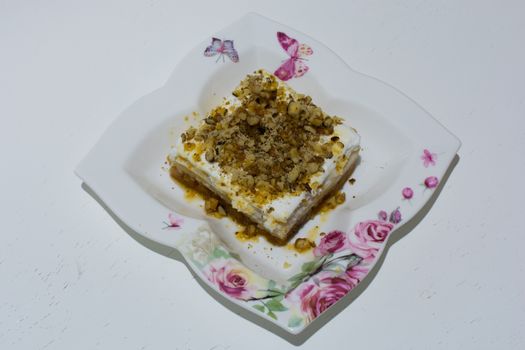 Fake bread dessert  from "Balikesir" Cuisine. creamy and walnut decorated Turkish dessert