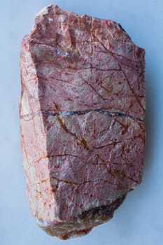 red, blue veined. pink colored stone