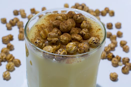 "Boza" is a winter drink made of millet, water and sugar. It is one of the oldest known Turkish drinks.  drink with roasted chickpea