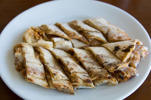 "Aydın" is made in the city "Bozdoğan". Turkish pide material tahini(sesame). served with "kaymak"(cream) on top. I have sweet, salty taste