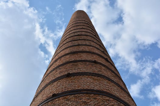 big factory pillar. made of bricks.