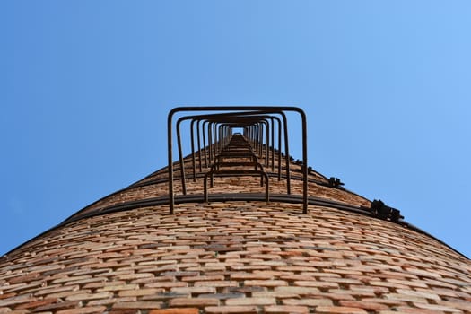 big factory pillar. made of bricks.