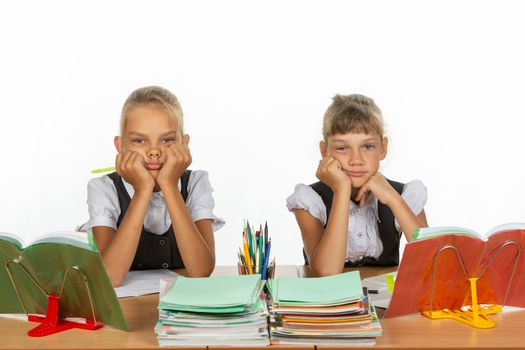 Two girls do not want to study in class