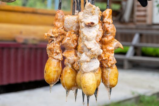 Skewers in the tandoor. Cooking kebab of meat in a tandoor