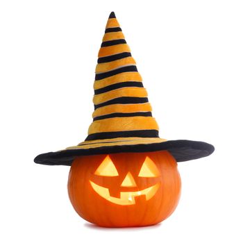 Jack O Lantern Halloween pumpkin in witches hat isolated on white background