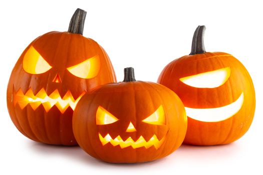 Three Halloween lantern Pumpkins isolated on white background