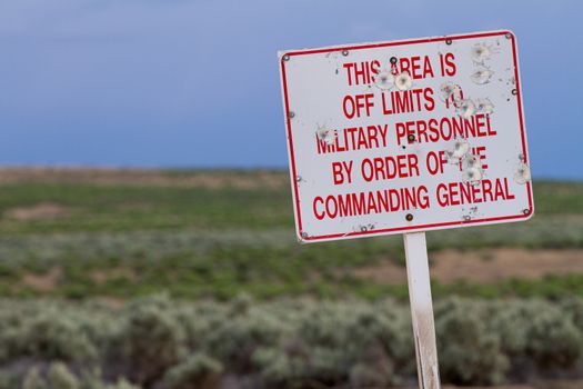 sign indicating the area is off limits off the military