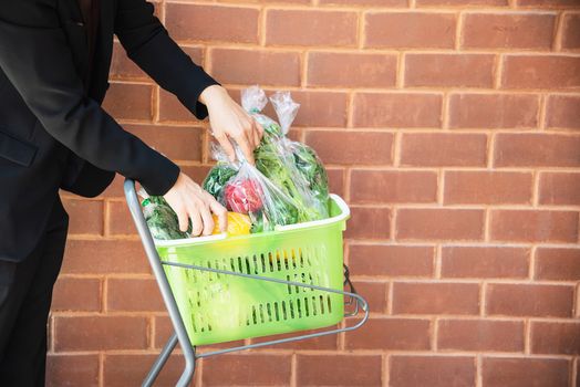 Man is shopping fresh vegetable in supermarket store - man in fresh market lifestyle concept