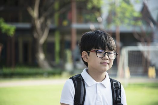 Young Asian Thailand boy happy going to school - children back to school concept.